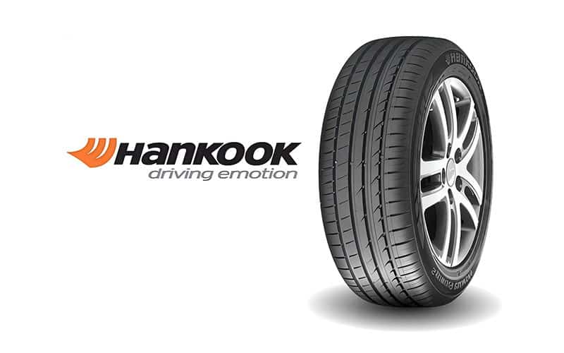Hankook tire with alloy wheel next to the Hankook logo and slogan “driving emotion.”
