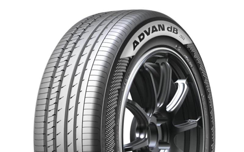 Yokohama Advan dB tire with detailed tread pattern on a black alloy wheel
